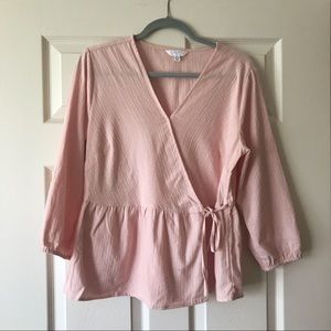 Pink 3/4 sleeve wrap peplum top with V neck